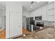 Kitchen boasts granite countertops and stainless steel appliances at 3957 Picasso Ct, Charlotte, NC 28205