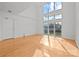 Bright living room with hardwood floors and large windows at 3957 Picasso Ct, Charlotte, NC 28205