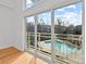 Bedroom with sliding doors opening to a pool view at 3957 Picasso Ct, Charlotte, NC 28205