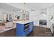 Stylish kitchen features a center island, white cabinetry and a microwave at 401 Stokes Ave, Clover, SC 29710