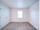 Spacious bedroom with double door closet and a window at 4830 Carnbrook Pl, Charlotte, NC 28212