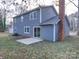 Gray house exterior with backyard patio at 4830 Carnbrook Pl, Charlotte, NC 28212