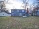 Gray house exterior with a backyard at 4830 Carnbrook Pl, Charlotte, NC 28212