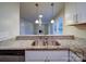 Kitchen with granite counters and stainless steel sink at 4830 Carnbrook Pl, Charlotte, NC 28212