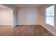 Bright living room with hardwood floors and neutral walls at 4830 Carnbrook Pl, Charlotte, NC 28212