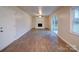 Living room with fireplace and sliding glass doors at 4830 Carnbrook Pl, Charlotte, NC 28212