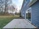 Concrete patio and sliding glass doors at 4830 Carnbrook Pl, Charlotte, NC 28212