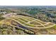 Aerial view of new homes and community, featuring landscaping and surrounding nature at 8616 Miles Gap Rd, Indian Land, SC 29707