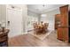 Bright dining room with hardwood floors and a wooden table set at 9243 Island Overlook Ct, Cornelius, NC 28031