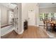 Elegant entryway with hardwood floors and a view into a home office at 9243 Island Overlook Ct, Cornelius, NC 28031