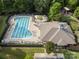 Community pool with lap lanes, clubhouse, and surrounding lounge chairs at 9243 Island Overlook Ct, Cornelius, NC 28031