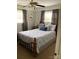 Bright bedroom with a comfortable bed and gray curtains at 9608 Sunway Dr # 4, Mint Hill, NC 28227