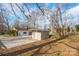Backyard featuring the rear of the property and a storage shed at 1254 Huckleberry Dr, Lincolnton, NC 28092