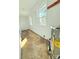 Unfinished basement with concrete floors, two windows, and utility unit at 1254 Huckleberry Dr, Lincolnton, NC 28092
