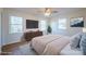 Bedroom featuring large windows, a ceiling fan, hardwood floors, and ample natural light at 1254 Huckleberry Dr, Lincolnton, NC 28092