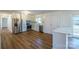 Modern kitchen boasting stainless steel appliances, white cabinets, and granite countertops at 1254 Huckleberry Dr, Lincolnton, NC 28092