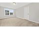 Spacious bedroom with neutral walls and carpet at 13026 Arnold Palmer Cir # 1051, Lancaster, SC 29720