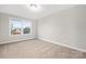 Simple bedroom with carpet and windows at 13026 Arnold Palmer Cir # 1051, Lancaster, SC 29720