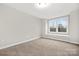 Bedroom with window seat and carpet at 13026 Arnold Palmer Cir # 1051, Lancaster, SC 29720