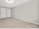 Bright bedroom with neutral walls and carpet at 13026 Arnold Palmer Cir # 1051, Lancaster, SC 29720