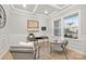 Bright home office with wainscoting, hardwood floors, and built-in desk at 13026 Arnold Palmer Cir # 1051, Lancaster, SC 29720