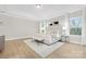 Bright main bedroom with hardwood floors and large windows offering natural light at 13026 Arnold Palmer Cir # 1051, Lancaster, SC 29720