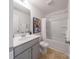 Clean bathroom with a white vanity, a mirror, and a shower-tub combination at 3035 Howell Mill Rd # 51, Charlotte, NC 28208