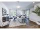 Cozy living room featuring stylish decor, neutral tones, and ample natural light at 3035 Howell Mill Rd # 51, Charlotte, NC 28208