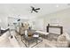 Bright living room featuring a ceiling fan, open layout, and contemporary furnishings at 522 Waco Rd, Kings Mountain, NC 28086