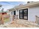 Wooden deck with access to backyard and French doors at 5442 Kinsale Ln, Charlotte, NC 28215