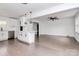 Bright kitchen with white cabinets, stainless steel appliances, and an island at 5442 Kinsale Ln, Charlotte, NC 28215