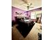 Purple bedroom with a queen-size bed and large windows at 6219 Long Pine Dr # 32, Charlotte, NC 28227
