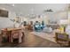 Open concept dining area with wood table and pink chairs, adjacent to kitchen at 8620 Miles Gap Rd, Indian Land, SC 29707