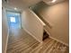 Bright entryway with stairs and wood-look flooring at 1063 Horizon Ln, Chester, SC 29706