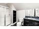 Bathroom with shower, toilet, and dark vanity with granite top at 1076 Fox Chase Dr, Newton, NC 28658