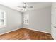 Spacious bedroom with hardwood floors and a ceiling fan at 1076 Fox Chase Dr, Newton, NC 28658