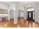 Bright entryway with hardwood floors and archways at 1076 Fox Chase Dr, Newton, NC 28658