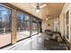 Spacious screened porch overlooking the backyard with ceiling fans at 1076 Fox Chase Dr, Newton, NC 28658