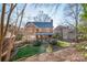 Brick home with a large backyard and deck at 1103 Hulston Ct, Charlotte, NC 28211