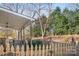 Private backyard with wooden fence and deck at 1103 Hulston Ct, Charlotte, NC 28211