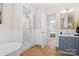 Contemporary bathroom with a walk-in shower and double vanity at 1103 Hulston Ct, Charlotte, NC 28211