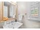 Elegant bathroom with a white sink and vanity, and updated fixtures at 1103 Hulston Ct, Charlotte, NC 28211