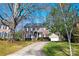 Brick house with attached garage and manicured lawn at 1103 Hulston Ct, Charlotte, NC 28211