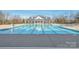 Large community swimming pool with adjacent clubhouse at 1209 Cedar Park Dr, Pineville, NC 28134