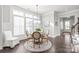 Bright dining area with a round table and chairs, near an entryway at 1209 Cedar Park Dr, Pineville, NC 28134