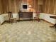 Basement dining area with wood flooring and antique furniture at 16480 Indian Mound Rd, Norwood, NC 28128