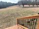 Deck overlooking a large grassy backyard at 16480 Indian Mound Rd, Norwood, NC 28128