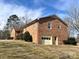 Brick ranch house with a carport and mature trees at 16480 Indian Mound Rd, Norwood, NC 28128