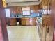 Retro kitchen with wood cabinets and blue countertops at 16480 Indian Mound Rd, Norwood, NC 28128