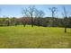 Open field with several trees in the background at 16480 Indian Mound Rd, Norwood, NC 28128